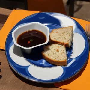 Delicious breakfast plate with cake and coffee