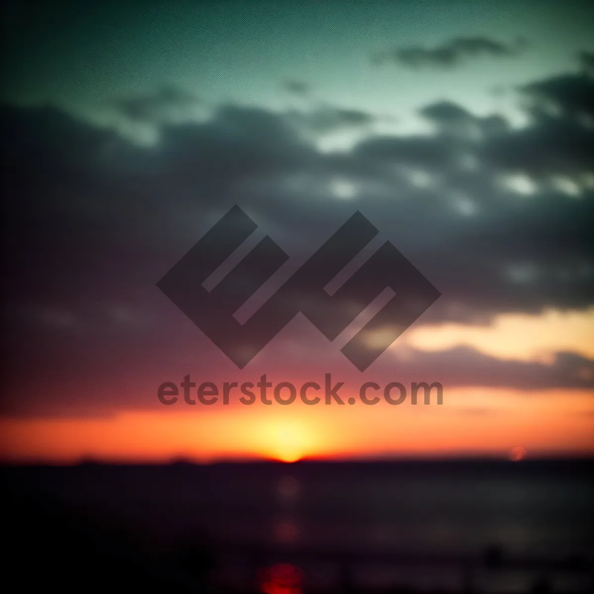 Picture of Vibrant Sunset Over Calm Ocean Waters