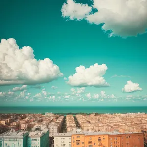 Vibrant Summer Sky with Clear, Fluffy Clouds.