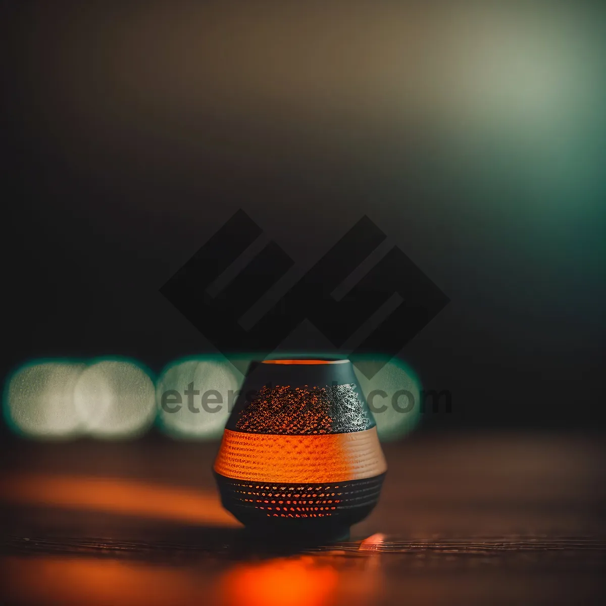 Picture of Protective microphone cap in thimble-shaped container.