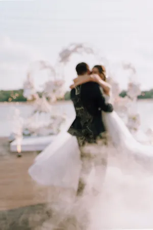 Happy newlywed couple smiling on their wedding day