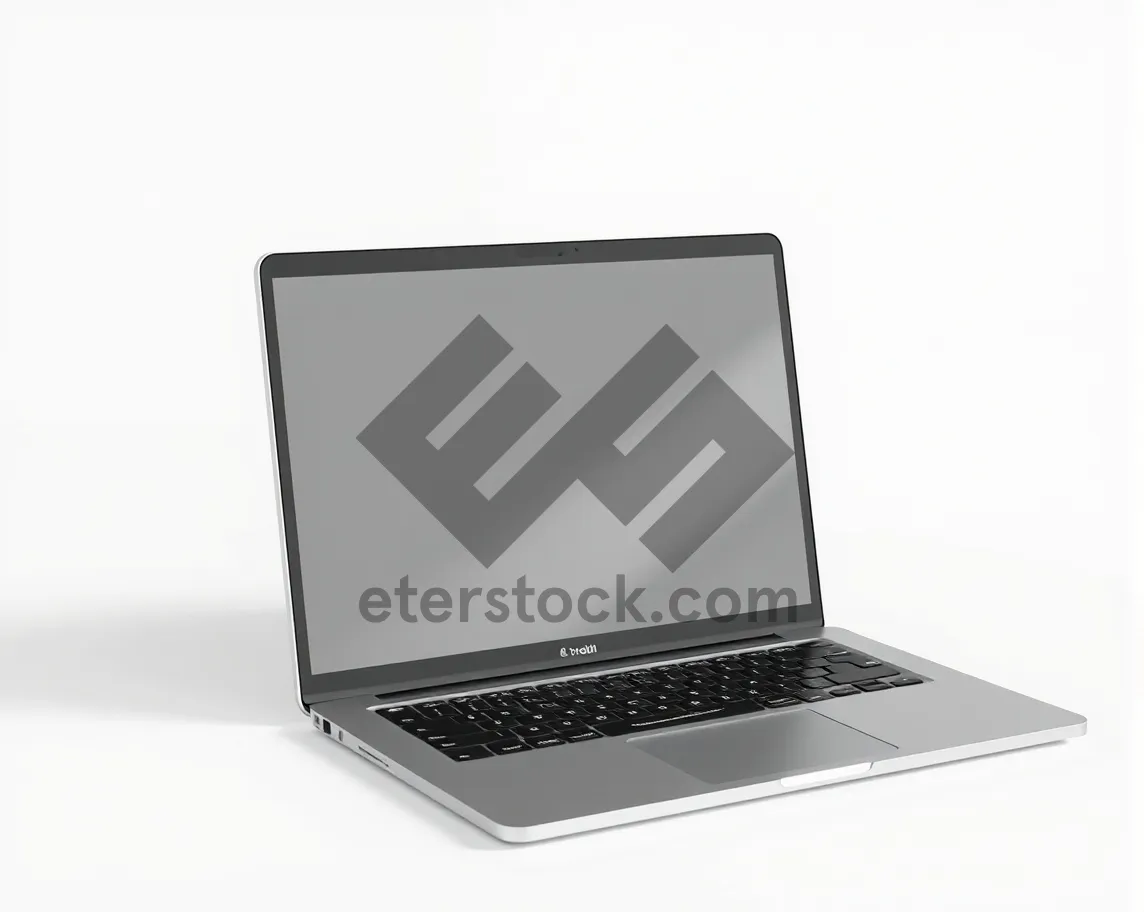 Picture of Black modern laptop with blank screen in office setting.