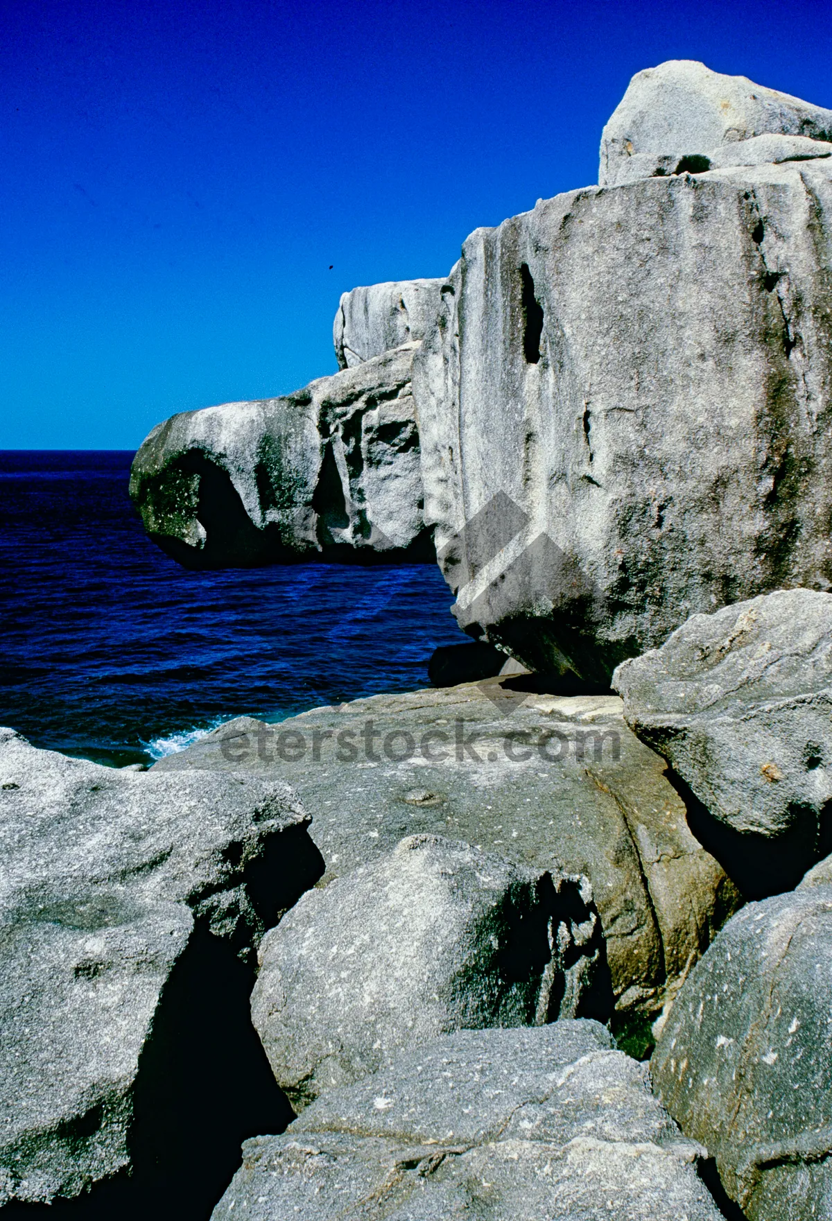 Picture of Coastal Mountain Cliff Landscape with Crystal Clear Water. The colors and crystal clear water of the archipelago of the Similan Islands National Park, Thailand, Asia