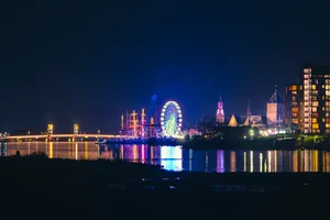 Night Skyline Reflection on River Waterfront