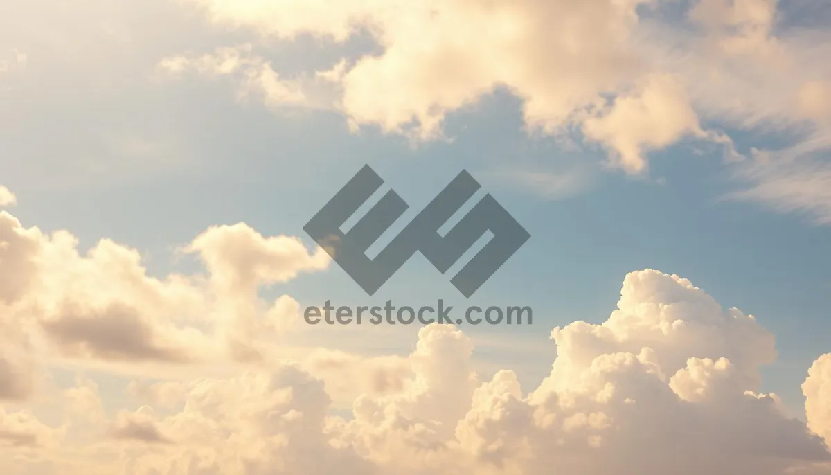 Picture of Vibrant sky over serene landscape on a sunny day.