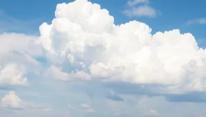 Vibrant summer sky with fluffy clouds