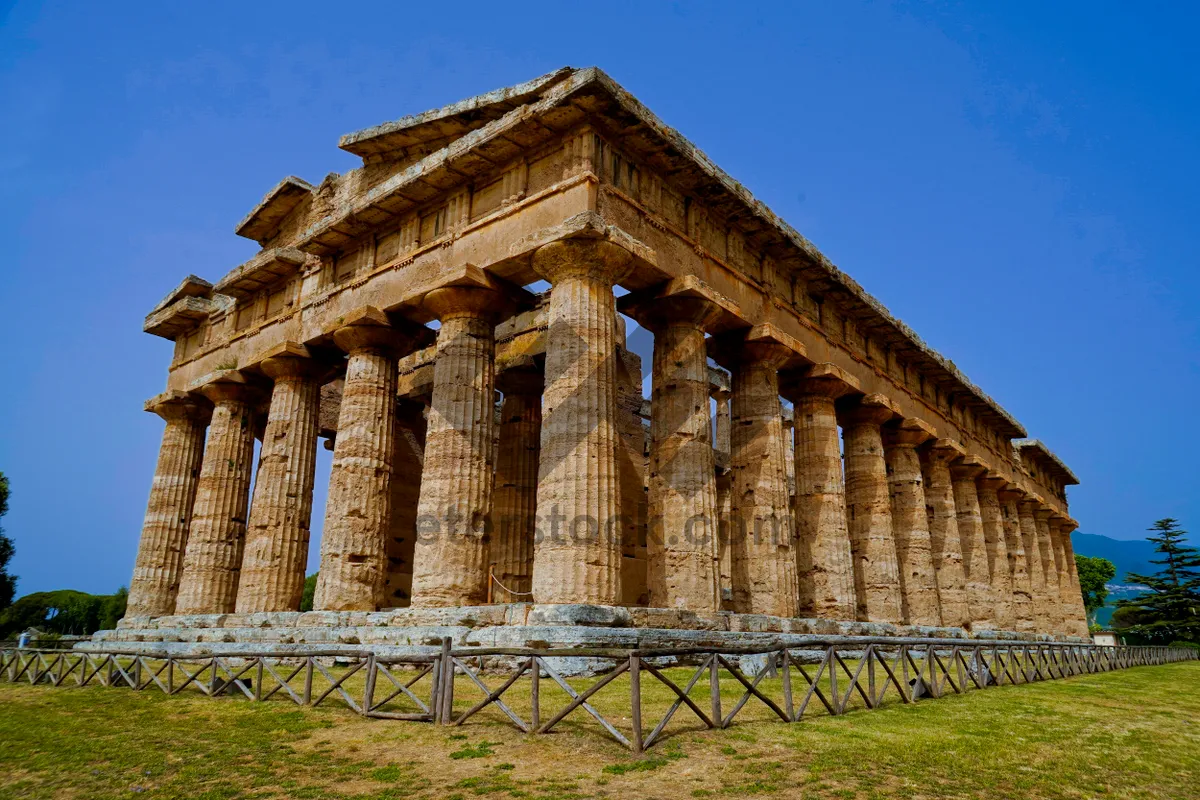 Picture of Ancient Roman Temple Columns Under Cloudy Sky