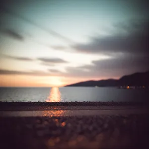 Serene Sunset Over Ocean Waves