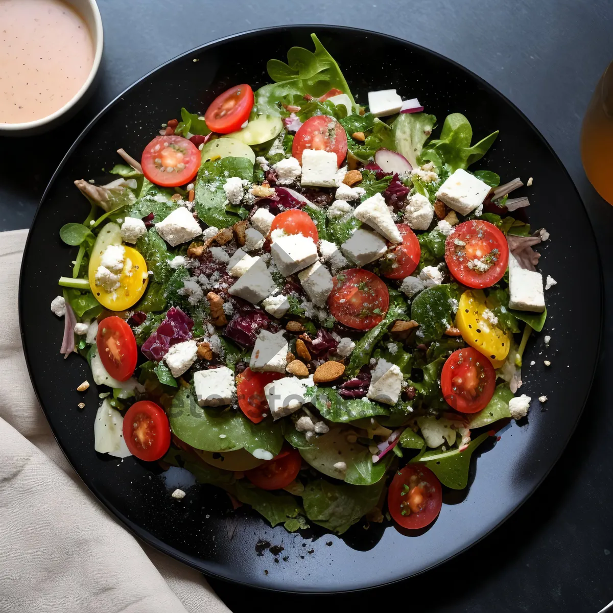 Picture of Fresh Vegetable Salad Plate with Cheese and Sauce