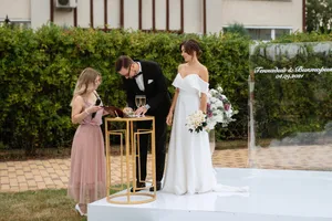 Happy couple celebrating their wedding day with flowers.