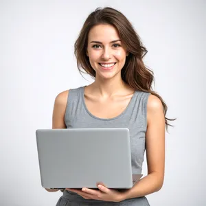 Attractive brunette professional lady working on laptop