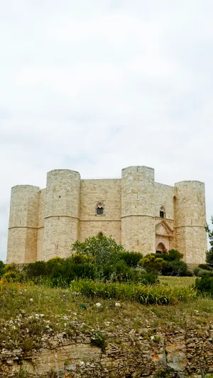 Ancient castle fortress against backdrop of clear blue sky