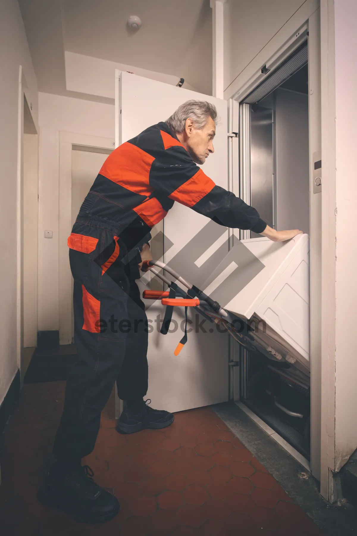 Picture of Businessman using treadmill at home