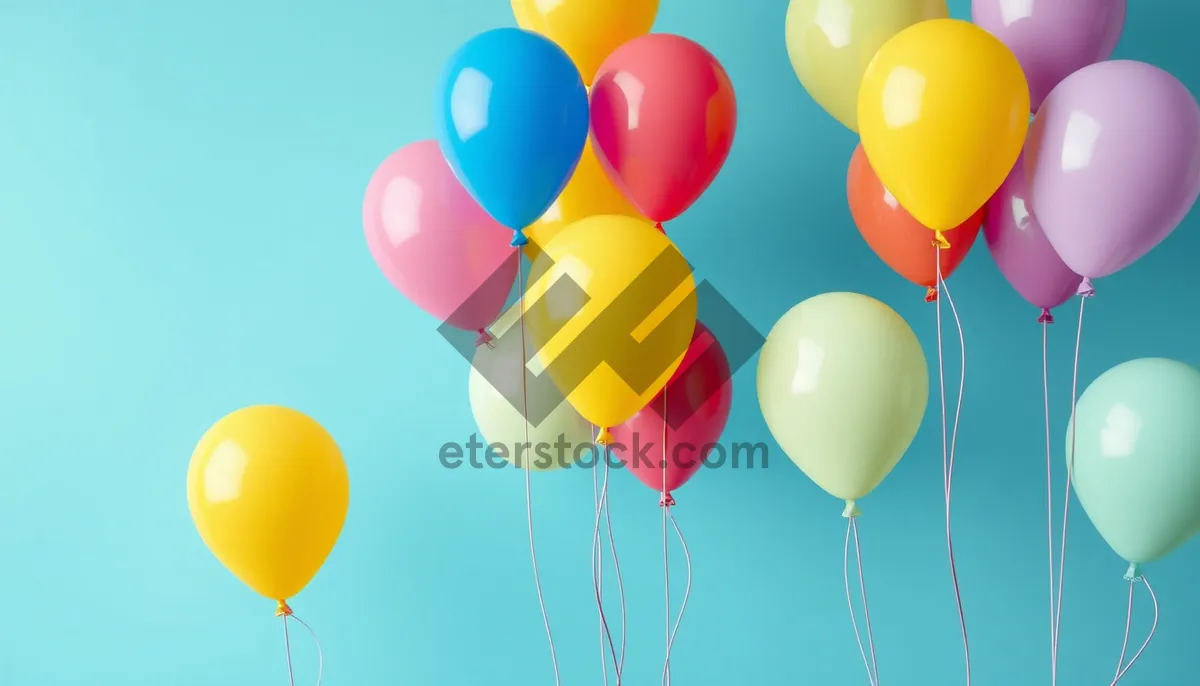 Picture of Colorful balloon party decoration in orange and yellow.