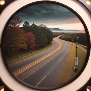 Car Mirror Reflection on Road during Drive