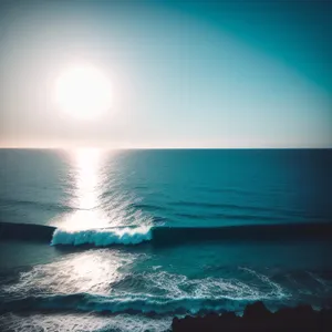 Sunset Serenity: Vibrant Waves on Tranquil Beach