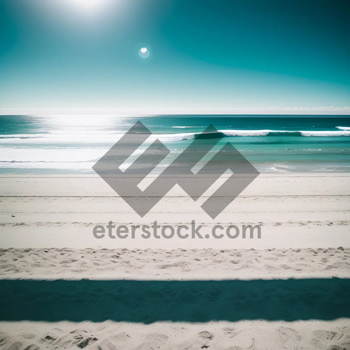 Picture of Serene Beachscape: Sun-kissed sands meet turquoise waves.