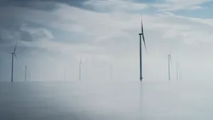 Renewable Energy Windmill in Industrial Landscape