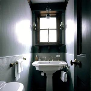 Modern bathroom with luxurious fixtures and clean lines.