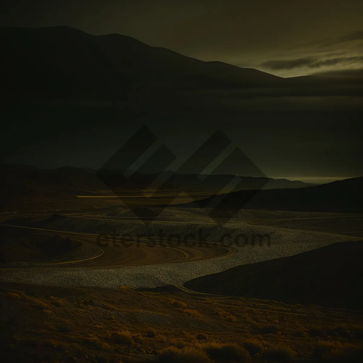 Picture of Vast Highlands at Sunset: Majestic Mountains, Desert Plains, and Cloudy Skies