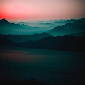Serene Sunset over Majestic Mountains