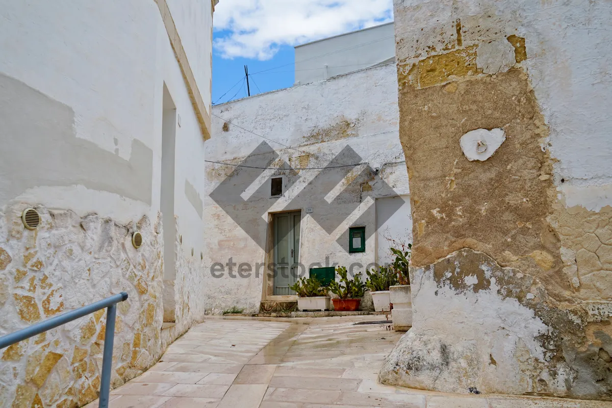 Picture of Medieval stucco house with brick walls in urban area