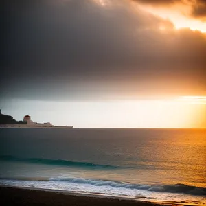 Sunset Over Ocean Waves