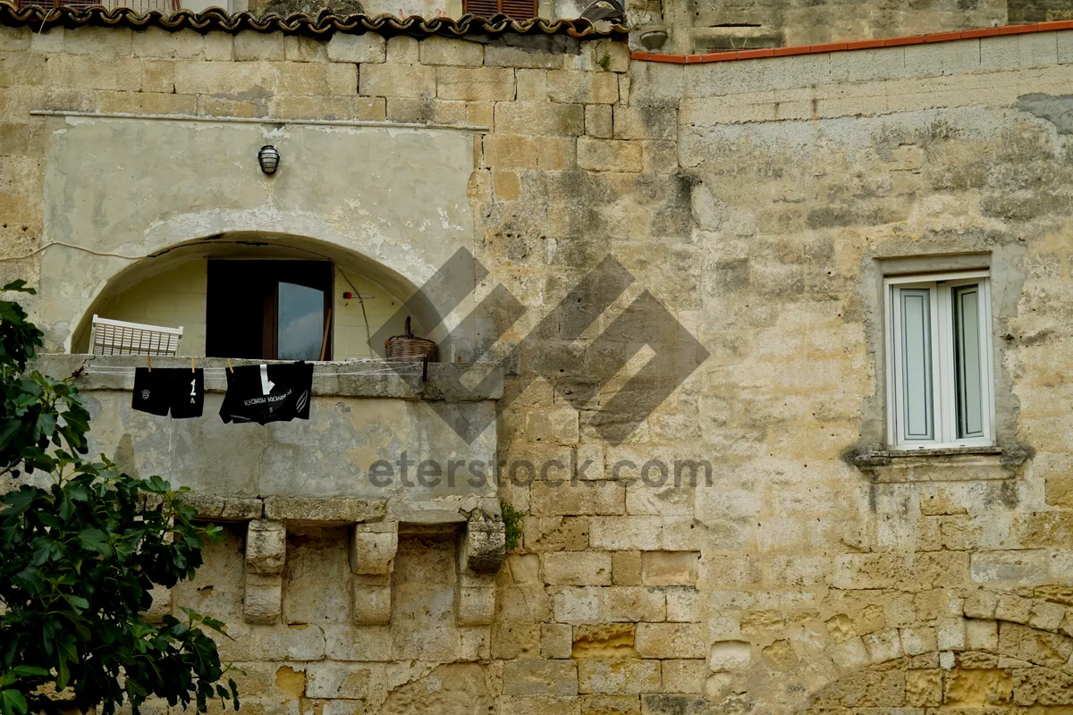 Picture of Old Medieval Castle Tower with Stone Walls and Windows