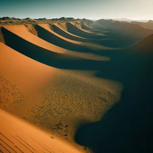 Spectacular Sunset Over Desert Dunes