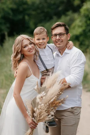 Happy wedding couple in the park