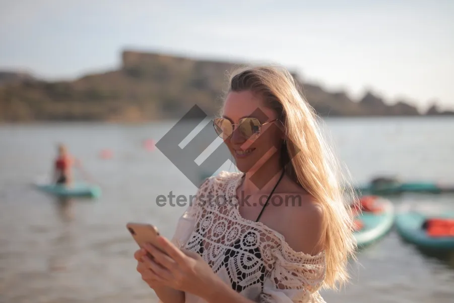 Picture of Stylish Brunette Fashion Model Smiling Happily At Camera