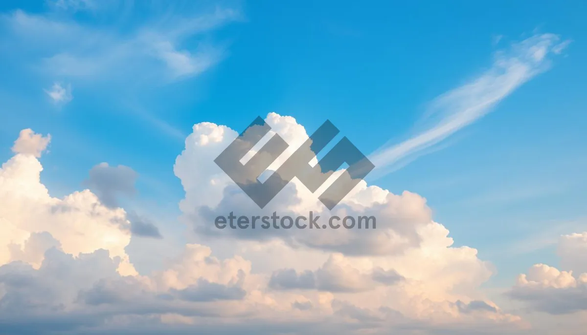 Picture of Vibrant Summer Sky with Fluffy Clouds