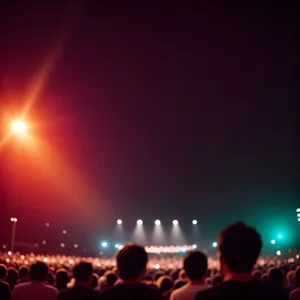 Laser Lights Illuminate Vibrant Patriotic Stadium Flag