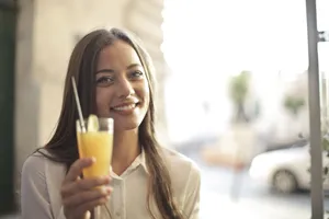 Attractive lady with a cheerful smile in 20s