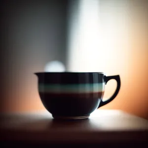 Hot Tea Cup on Saucer: Morning Beverage in Brown Ceramic Mug