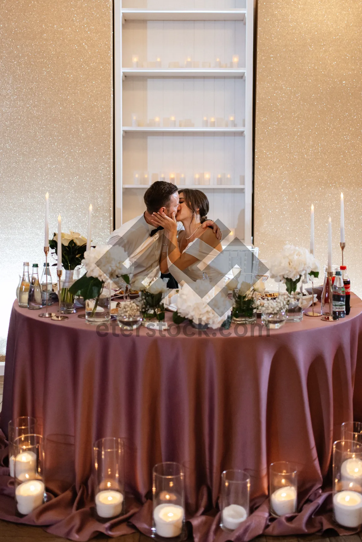 Picture of Happy couple celebrating wedding at fancy restaurant interior.