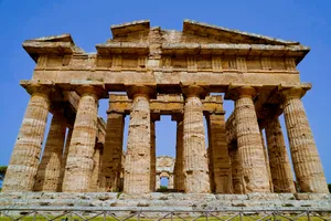 Ancient Roman Temple Ruins in Historic City Skyline