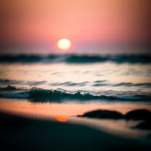 Serenity at Sunset: Ocean Waves Embracing the Horizon