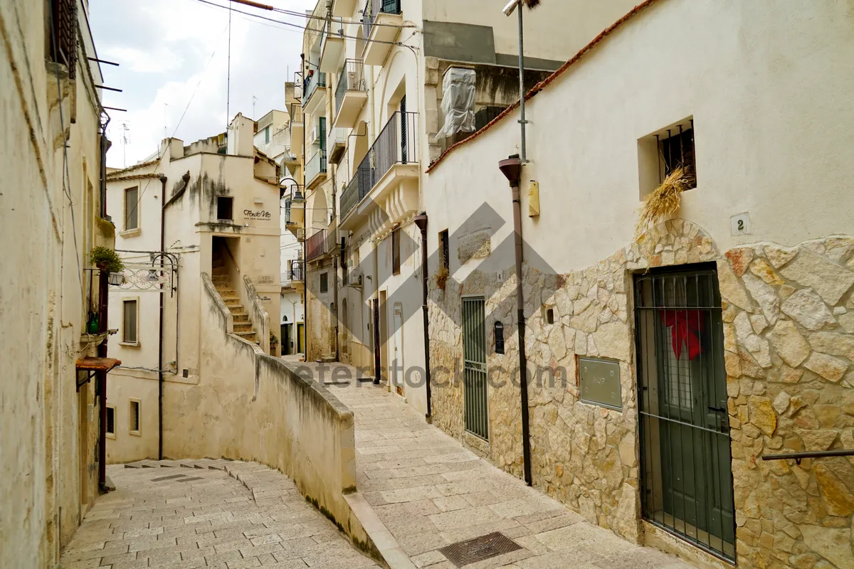 Picture of Medieval village street with ancient stone buildings.