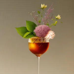 Stylish Wineglass with Rose and Fruit Garnish