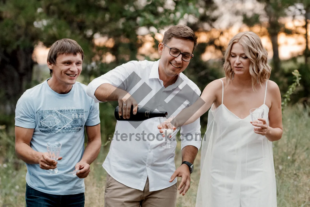 Picture of Happy couple smiling in the park outdoors