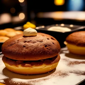 Delicious breakfast pastry with cream and coffee