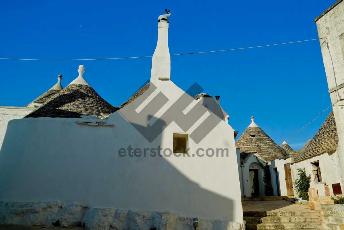 Picture of Historic cathedral tower against clear sky.