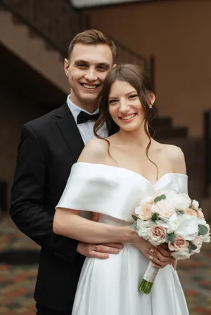 Happy groom and bride outdoors, wedding celebration