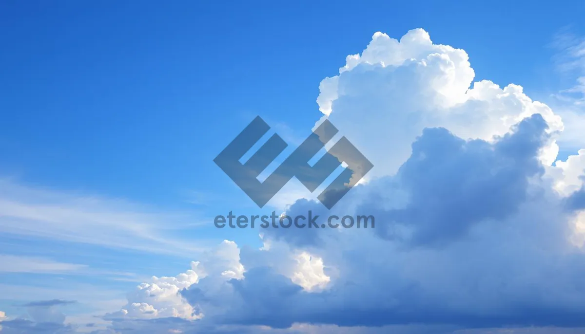 Picture of Summer Sky with Fluffy Clouds on a Sunny Day.